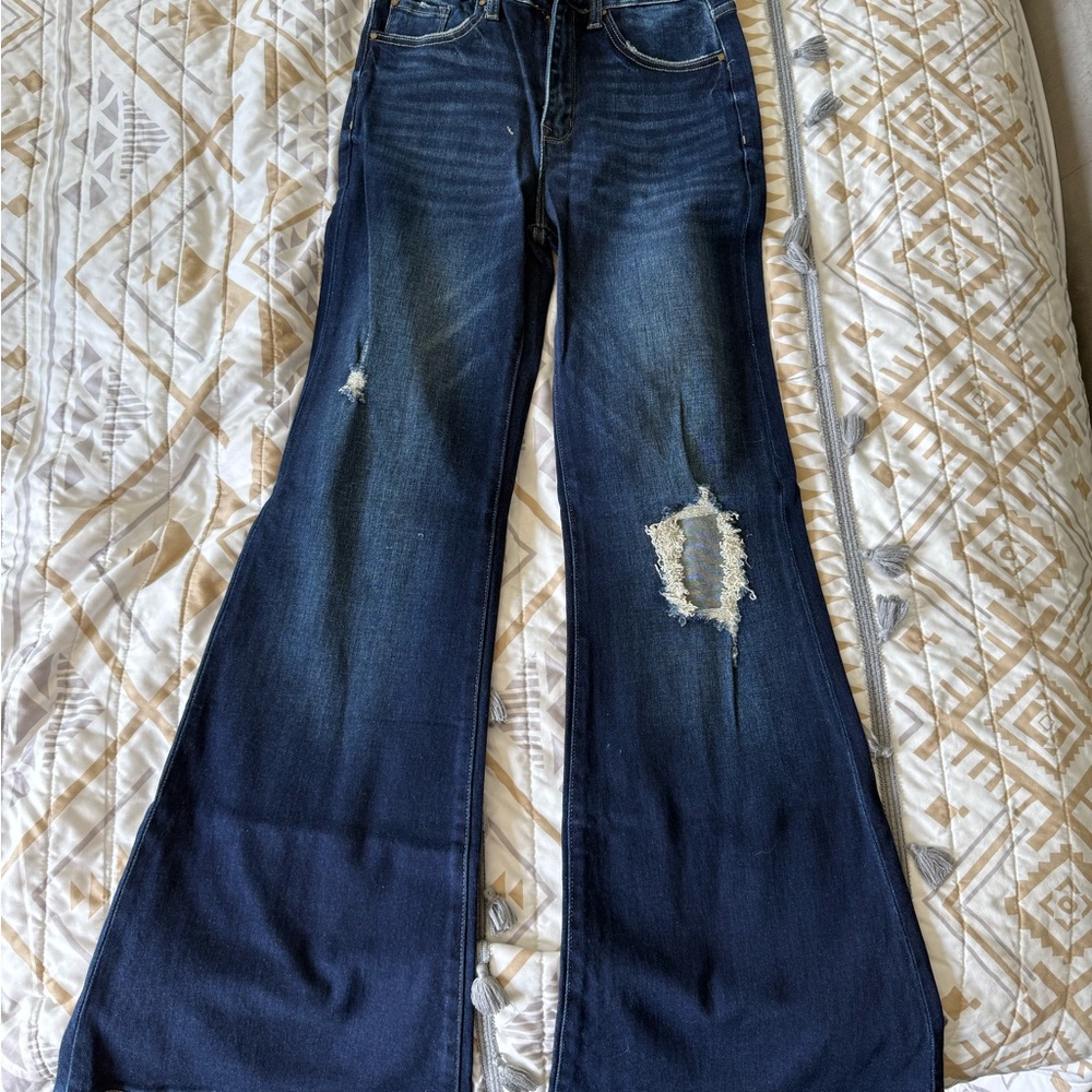 Petra Fashions Blue Flare Jeans with Vintage Distressing